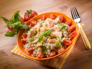 Risotto mit Lachsforelle und Tomaten