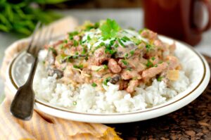 Schweinegeschnetzeltes mit Reis in Champignon-Creme-Sauce